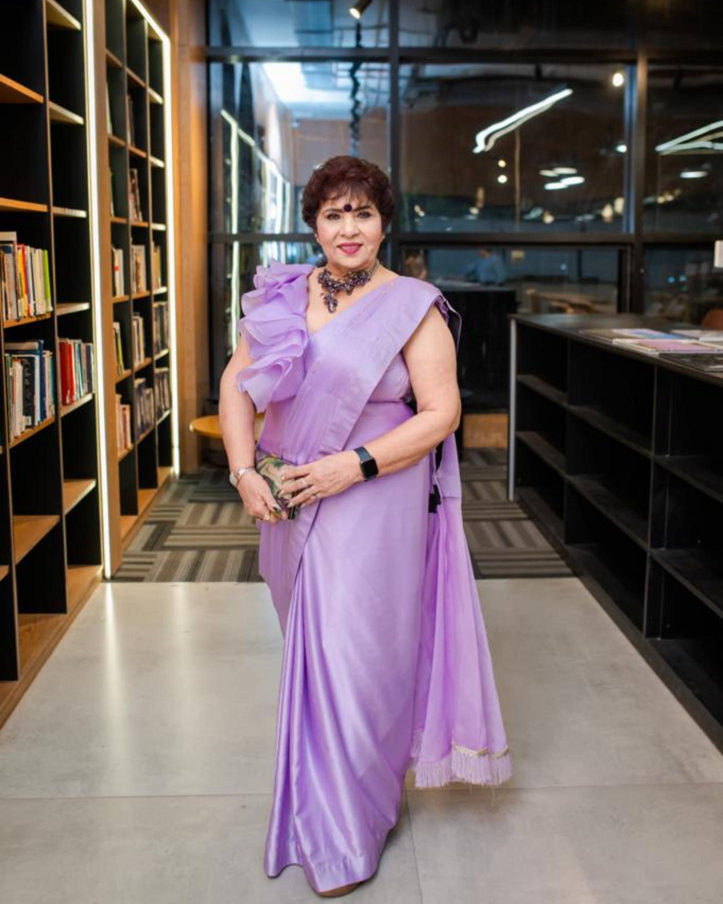 Lilac drape saree with power shoulder blouse