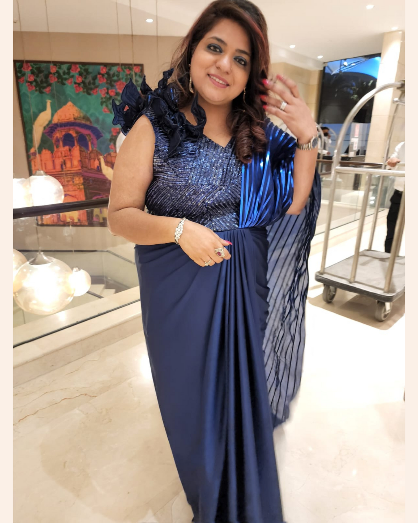 Blue drape saree with taping